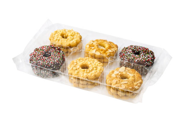 Chistmas wreath cookies in a plastic tray