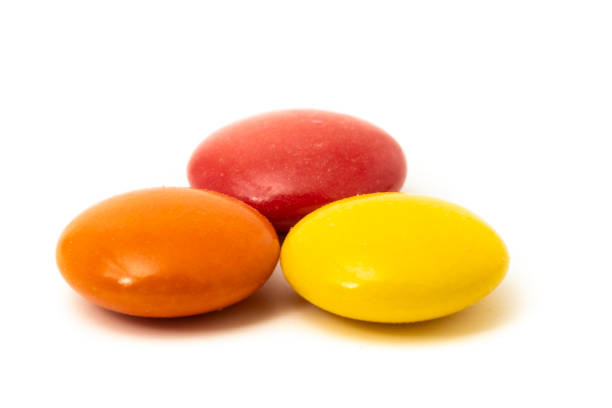 Colorful candies isolated on white background.