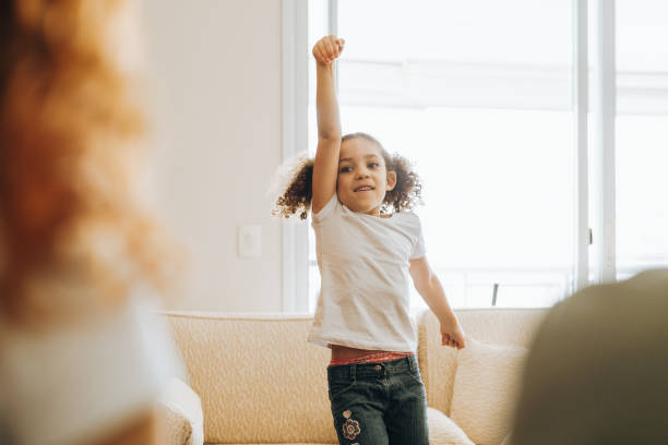 istock Girl playing guessing things at home 1370703249