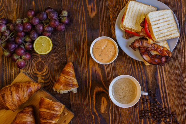 istock Romantic breakfast and freshly ground coffee on a wooden table 1370703393
