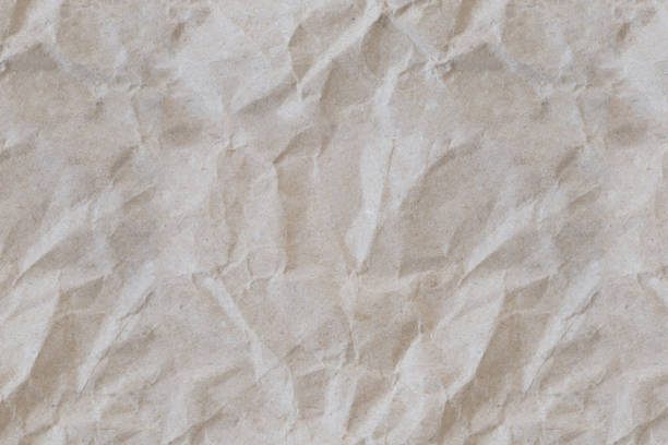 istock Craft aged old paper grunge recycled background 1370706375