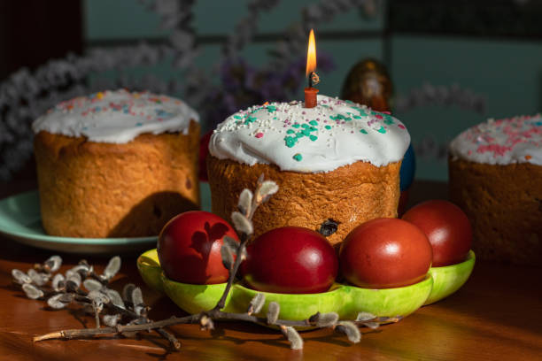 istock Elegant Easter cakes with burning candles on the dining table 1370711227