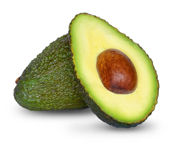 two halves of fresh avocado isolated - fat portion studio shot close up imagens e fotografias de stock