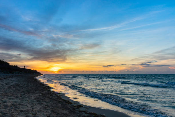 istock Beautiful sunset on the ocean shore in the evening 1370711721