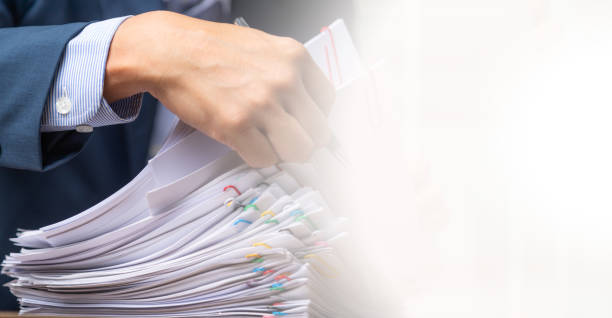 istock Businessman signing documen,  hand writing. 1370711728