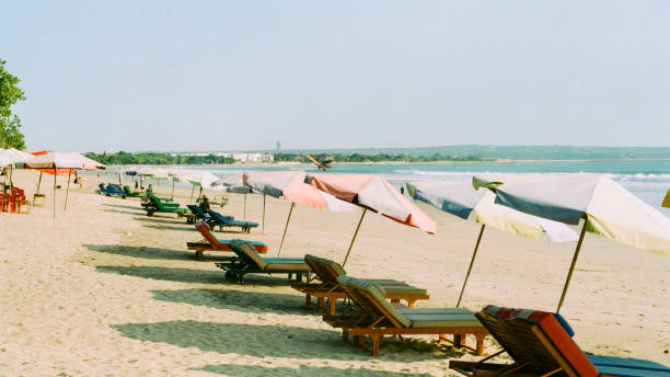 istock Row of sunbath chairs at Kuta beach 2 1370712062