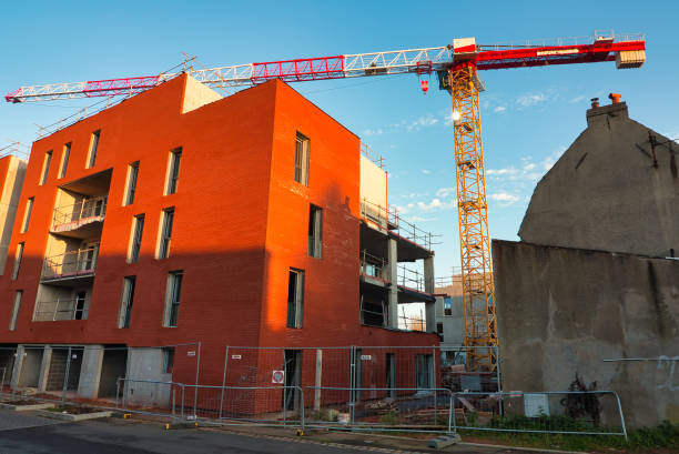 a crane on a construction site stock photo
