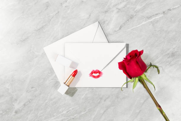 istock letter envelope and lipstick mark on background 1370717246