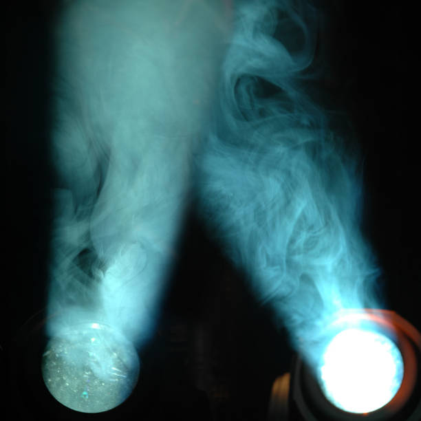istock Blue spotlights and smoke 1370718190