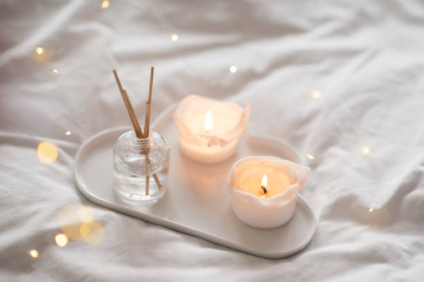 istock Home perfume in glass botle in bed 1370718693