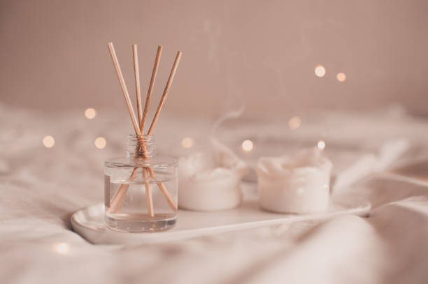 istock Home perfume in glass botle in bed 1370718695