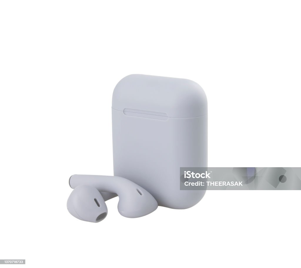 Grey headphones wireless earphones with case  isolated white background Wireless In-ear Headphones Stock Photo