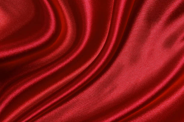 istock Red silk or satin luxury fabric texture can use as abstract background. Top view 1370718782