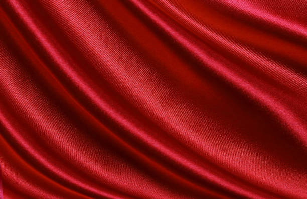 istock Red silk or satin luxury fabric texture can use as abstract background. Top view 1370718784