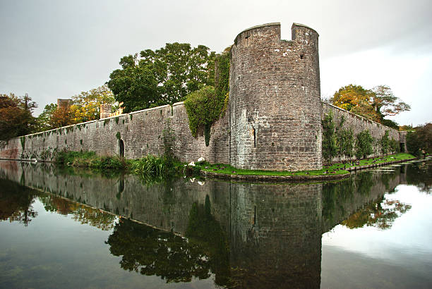 istock Medieval Moat at Bishop's Palace Wells Somerset SW England 137072039