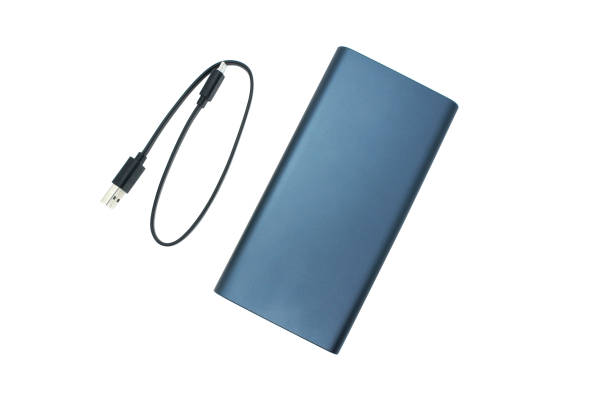 istock Power bank and USB cable isolated on white background. External aluminum battery for charging various devices. 1370723752