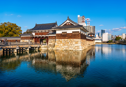 24 march 2019, Hiroshima - Japan: The Hiroshima Castle outer moat and main gate. Hiroshima Castle was originally built in the late 16th century and reconstructed in 1958 after being destroyed during World War II.
