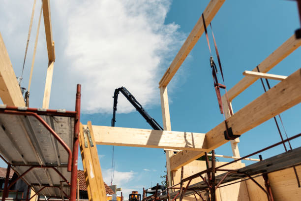 istock Wooden beam construction of structure against blue sky 1370724735