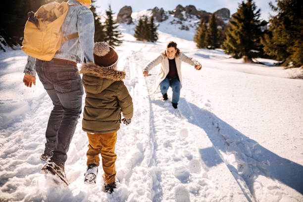 istock Family in a winter walk 1370726496