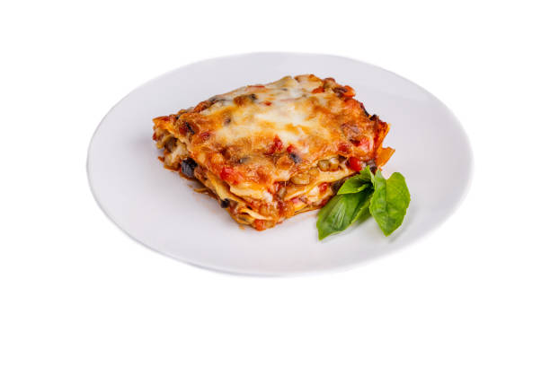 istock lasagna on light plate on white background for restaurant menu 1370732374