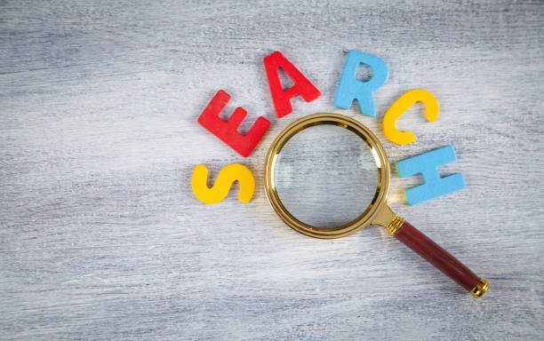 istock Colorful word Search with magnifying glass. 1370732423