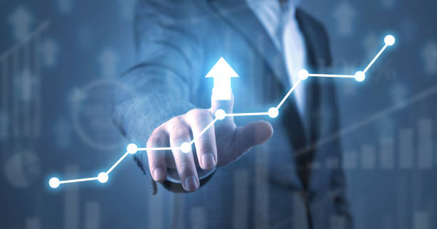 istock Man showing growth graph and financial charts. 1370732440