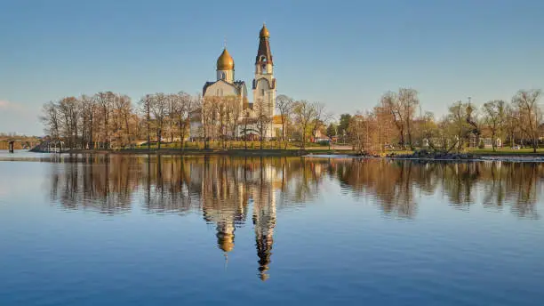 Panorama of Petrovskaya Embankment and the Orthodox Cathedral in Sestroretsk near the lake.