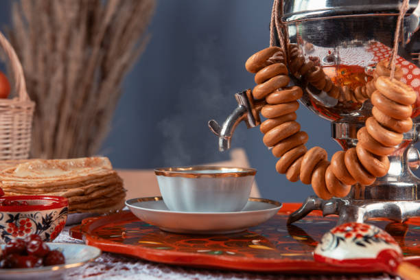 istock Russian pancakes blini with samovar tea cup and drying on the table 1370735514