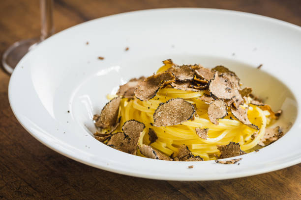 istock Pasta with truffles.Tagliatelle with fresh truffle copy space. 1370737406