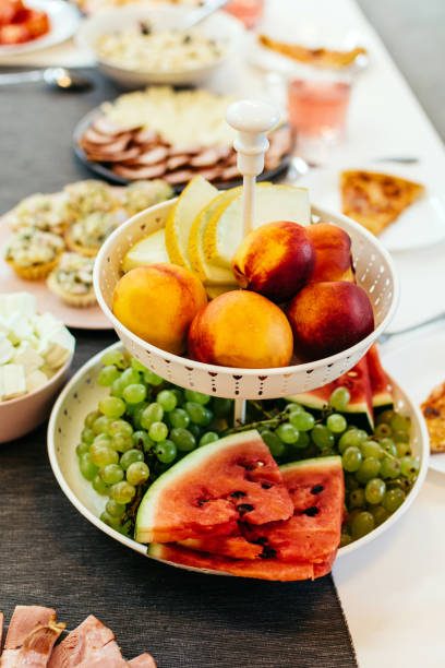 istock Plate with different fruits on the festive table vertical 1370737408