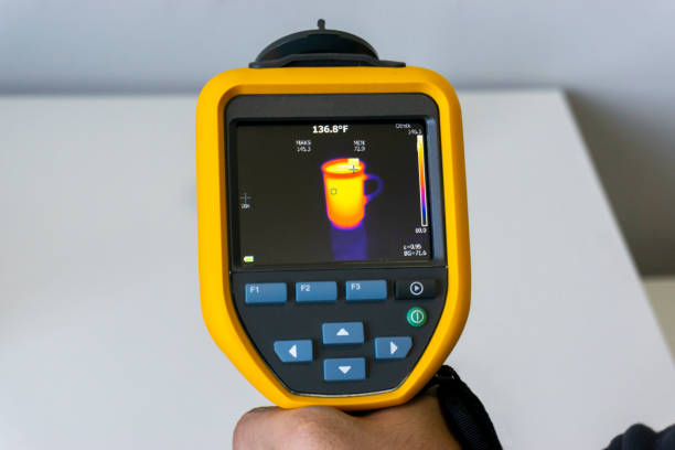 istock Infrared thermal camera displays glass with hot liquid inside 1370748053