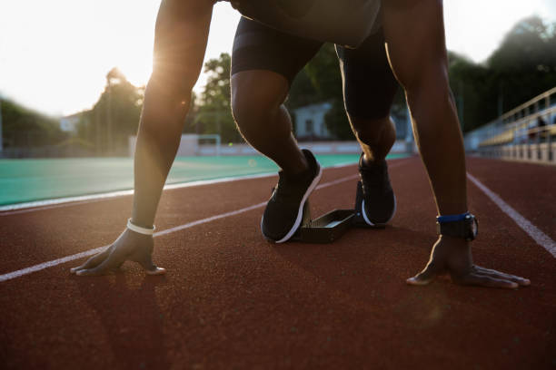 istock Cropped image of a young african male sprinter getting ready 1370750168