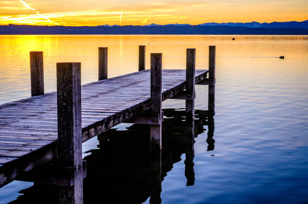 istock old wooden jetty at a lake 1370751439