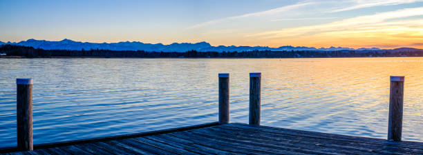 istock old wooden jetty at a lake 1370751470