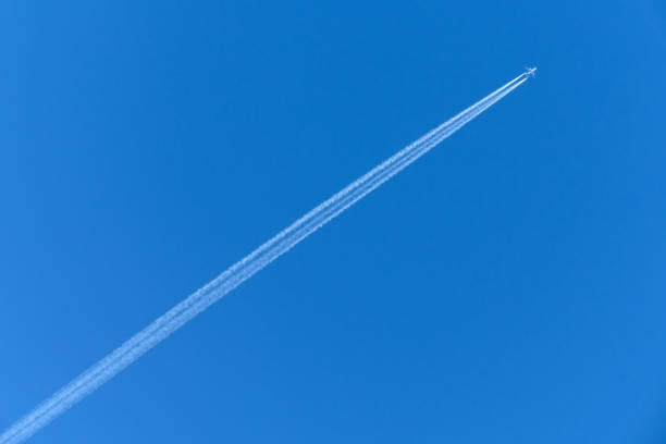 Contrails, or condensation trails ,or vapor trails are line-shaped clouds produced by aircraft engine exhaust or changes in air pressure, typically at aircraft cruising altitudes several miles above the Earth's surface.