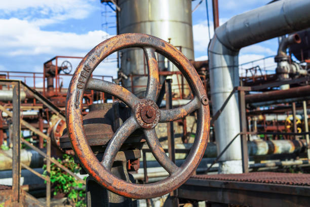 istock Rusty shut-off valves of a gas processing plant. 1370752277