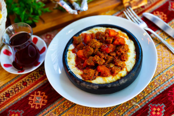 Turkish Food Hunkar Begendi Turkish Food Hunkar Begendi in a white ceramic plate hunkar begendi stock pictures, royalty-free photos & images