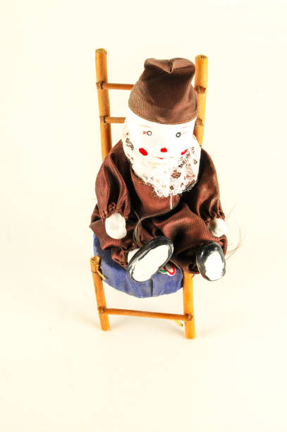 istock Pierrot toy doll on white background 1370758679