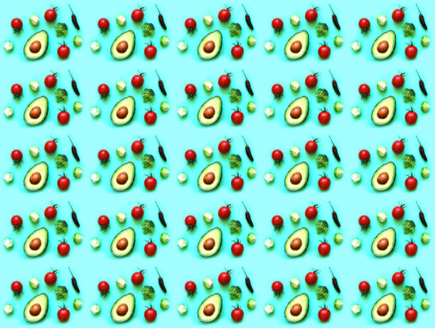 istock Creative pattern of fresh fruits and vegetables. Ingredients for proper nutrition or concept of healthy diet. Design for wrapping paper. 1370760073