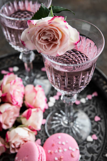 istock Two crystal champagne glasses for romantic party 1370760166