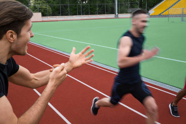 istock Trainer screaming near young multiethnic athlete men 1370760623