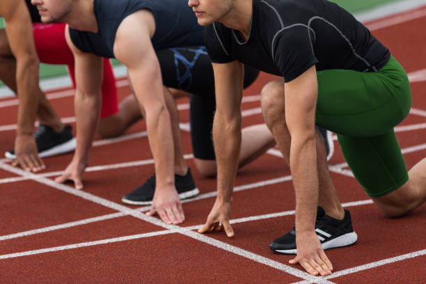 istock Cropped picture of multiethnic athlete group ready to run 1370760687