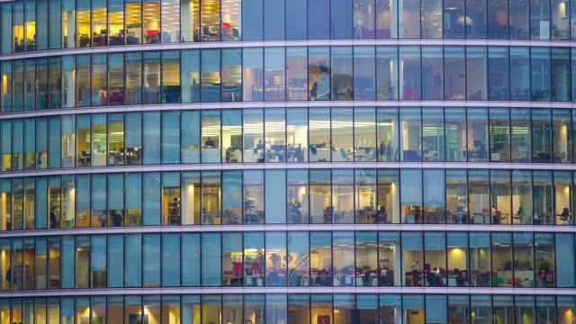 Time lapse Panning and up Skyscraper office business building  with movement of workers in London, England UK