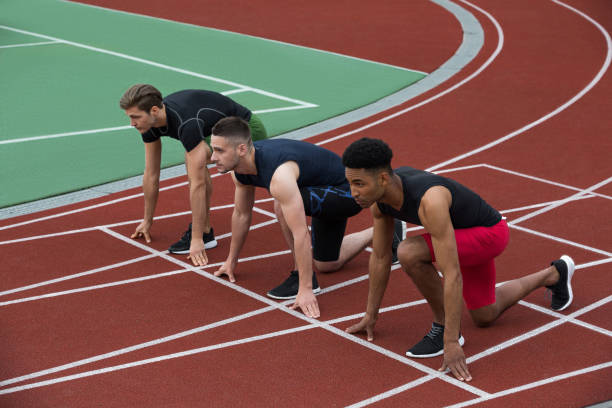 istock Serious multiethnic athlete group ready to run 1370761543