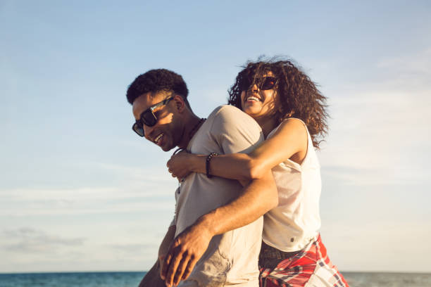 istock Happy afro american couple having fun together 1370762083