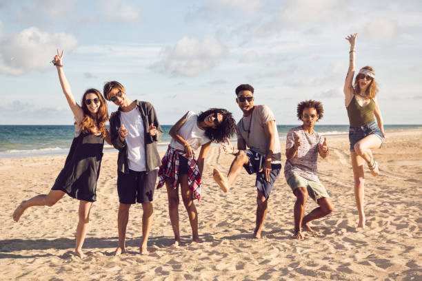 istock group of smiling friends wearing summer clothes 1370763492