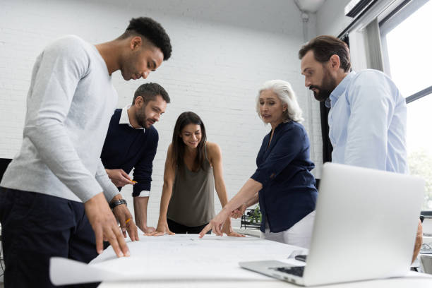 istock Group of business people discussing financial plan 1370764280