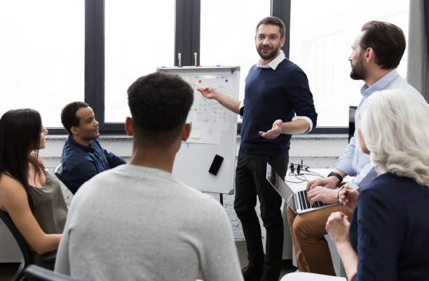 istock Business team discussing their ideas while working in office 1370764418