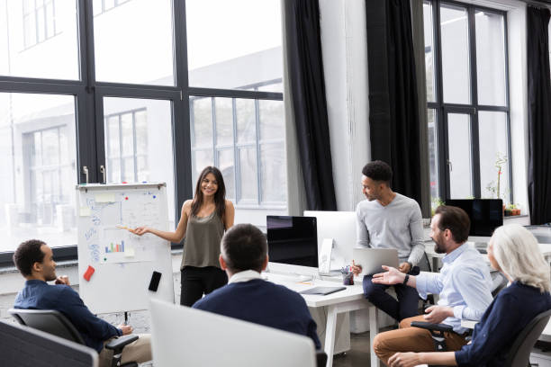 istock Business woman making a presentation at office 1370764848