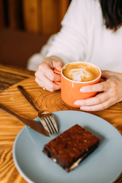 istock White chocolate brownie and a cup of coffee makes your day better 1370765477